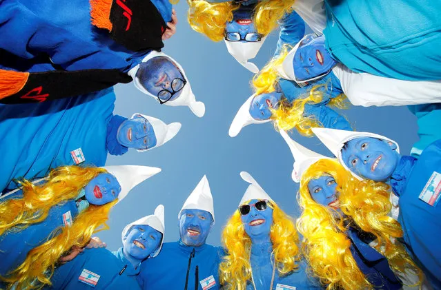 Participants dressed as smurfs pose during an attempt to hold the world's largest meeting of smurfs in a bid to outdo the previous record of 2,510 mostly student participants in Wales in 2009 in Lauchringen, Germany on February 16, 2019. (Photo by Arnd Wiegmann/Reuters)