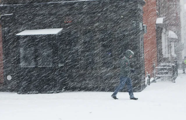 A pedestrian make his way through the snow and wind on February 9, 2017 in the Brooklyn borough of New York City. (Photo by Spencer Platt/Getty Images)