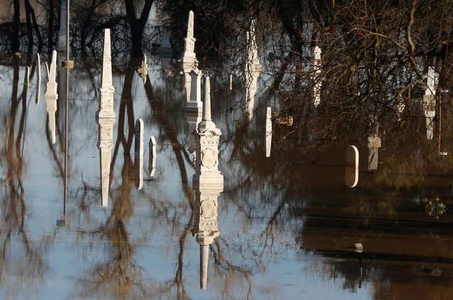 A cemetery is flooded in Marysville, California, after an evacuation was ordered for communities downstream from the dam in Oroville, California, U.S., February 14, 2017. (Photo by Jim Urquhart/Reuters)