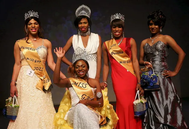 Newly crowned Miss Gay Jozi (Jozi is slang for Johannesburg), Ycer Machimane (seated), poses for photographers at the end of the pageant in Johannesburg,  May 24, 2015. (Photo by Siphiwe Sibeko/Reuters)