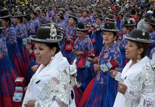 Morenada dancers perform during the "Senor del Gran Poder" (Lord of Great Power) parade in La Paz, May 30, 2015. According to local media, thousands of dancers participated in this annual pagan religious celebration. REUTERS/David Mercado