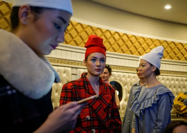 Models wait backstage during Kazakhstan Fashion Week in Almaty, Kazakhstan, April 19, 2016. (Photo by Shamil Zhumatov/Reuters)