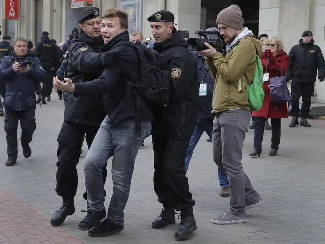 Belarus police detain journalist Roman Protasevich in Minsk, Belarus, Sunday, March 26, 2017. Dozens protestors were detained during attempt to rally in downtown Minsk. ﻿﻿(Photo by Sergei Grits/AP Photo)