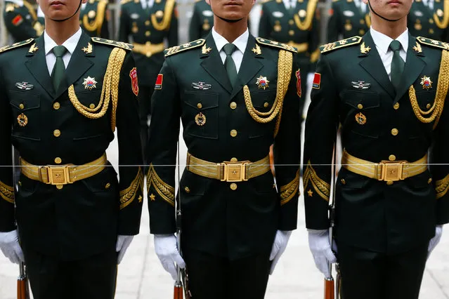 Members of the honour guard prepare for a welcoming ceremony attended by Chinese Premier Li Keqiang and Denmark's Prime Minister Lars Lokke Rasmussen  at the Great Hall of the People in Beijing, China May 3, 2017. (Photo by Thomas Peter/Reuters)