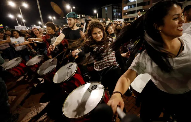 People play drums during a protest in Bogota, Colombia, 28 November 2019. Under the slogan “Tambores a las Calles” (Drums in the treets), hundreds of percussionists gathered to protest against the government of Colombian President Ivan Duque Marquez. Colombia has recently witnessed a wave of anti-government protests that escalated on 25 November with the death of 18-year-old Dilan Cruz after he was hit by a projectile allegedly fired by police in Bogota. (Photo by Mauricio Duenas Castaneda/EPA/EFE)