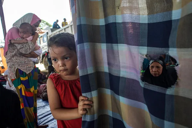Displaced Filipino villagers take shelter at a gymnasium turned into a temporary evacuation center as fighting between Islamist militants and government forces continues in Marawi City, Mindanao Island, southern Philippines, 05 June 2017. According to media reports, at least 174 people have been killed in ongoing clashes between militants linked to the so-called Islamic State (IS) militant group and the Philippine Army in the southeastern city of Marawi. The clashes began on 23 May when a military operation failed to capture Isnilon Hapilon, the leader of the extremist group Abu Sayyaf who was being safeguarded by members of the Maute Group, both groups pledged alliance to IS. Philippine President Rodrigo Duterte declared martial law for the island of Mindanao on the same day that the conflict emerged. (Photo by Linus G. Escandor IiEPA)