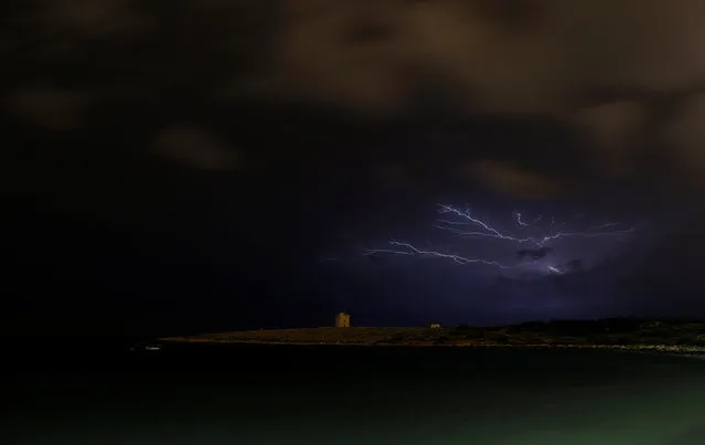 Lightning streaks over St Mark's Tower, a 17th century coastal fortification near the village of Bahar-ic-Caghaq on the north coast of Malta, November 19, 2016. (Photo by Darrin Zammit Lupi/Reuters)