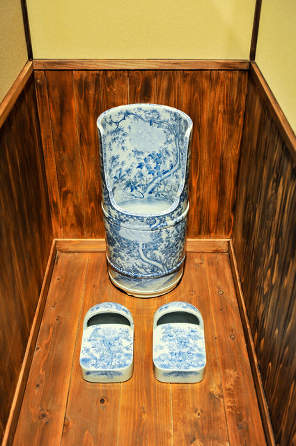 An old toilet is displayed during the “Toilet!? Human Waste and Earth's Future” exhibition at The National Museum of Emerging Science and Innovation – Miraikan on July 1, 2014 in Tokyo, Japan. The exhibition focuses on how the toilet has changed our daily lives and discovers what the most environment-friendly and ideal toilet is. (Photo by Keith Tsuji/Getty Images)