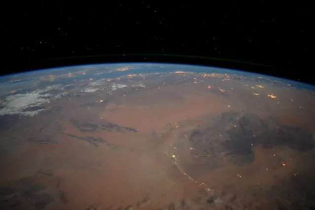 Tim Peake took this picture of the Sahara desert at night and wrote, “you can really see how thin the Earth's atmosphere is in this pic”. (Photo by Tim Peake/ESA/NASA)