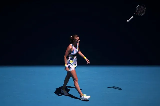 Czech Republic's Petra Kvitova throws her racquet to the floor during her quarter final match against Australia's Ashleigh Barty at the Australian Open on January 28, 2020. (Photo by Hannah Mckay/Reuters)