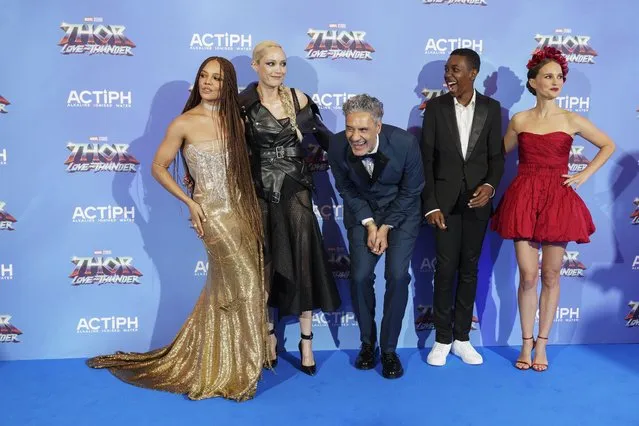 Tessa Thompson, from left, Pom Klementieff, director Taika Waititi, Kieron L. Dyer and Natalie Portman pose for photographers upon arrival at the screening of the film Thor: Love and Thunder in London Tuesday, July 5, 2022. (Photo by Scott Garfitt/AP Photo)
