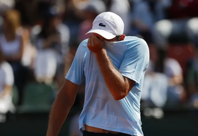Uruguay's Martin Cuevas reacts after loosing a set against China's Zhang Zhizhen during a Davis Cup World Group II tennis match in Montevideo, Uruguay, Saturday, September 17, 2022. (Photo by Matilde Campodonico/AP Photo)