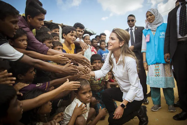 In this handout image supplied by the Jordanian Royal Court, Queen Rania of Jordan meets Rohingya muslim refugees during her visit to the Kutupalong camp on October 23, 2017 in Ukhia, Bangladesh. (Phoro by Jordanian Royal Court via Getty Images)