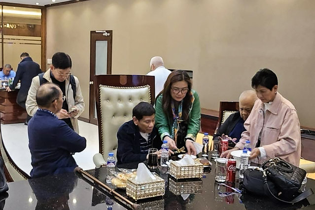 This handout photo taken and released by the Partido Demokratiko Pilipino-Lakas ng Bayan (PDP Laban) on March 11, 2025, shows former Philippines' president Rodrigo Duterte (C) inside the Villamor Air Base in Pasay, Metro Manila, after arriving from Hong Kong. Former Philippines president Rodrigo Duterte, arrested on March 11 on an International Criminal Court warrant for alleged crimes against humanity during his “war on drugs”, once said he would be happy to kill three million addicts. (Photo by Handout/Partido Demokratiko Pilipino-Lakas NG Bayan (PDP LABAN)/AFP Photo)