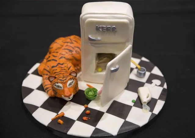A cake decorated as a scene from Judith Kerr's children's book "The Tiger Who Came to Tea" is displayed at the Cake and Bake show in London, Britain October 3, 2015. (Photo by Neil Hall/Reuters)