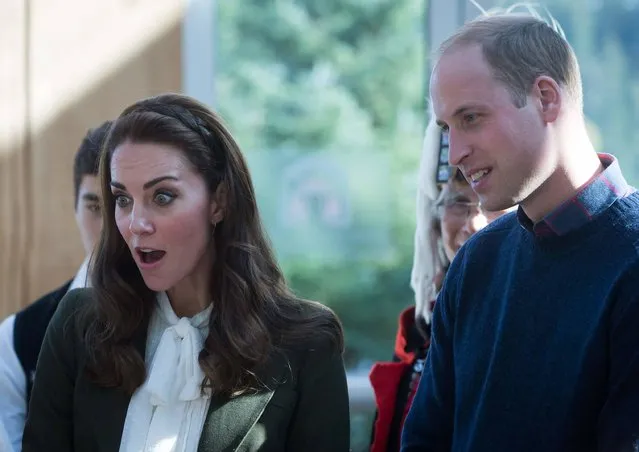 The Duke and Duchess of Cambridge, learn about local fish during a visit to the Haida Heritage Centre and Museum in Haida Gwaii, British Columbia on September 30, 2016. (Photo by Darryl Dyck/AFP Photo)