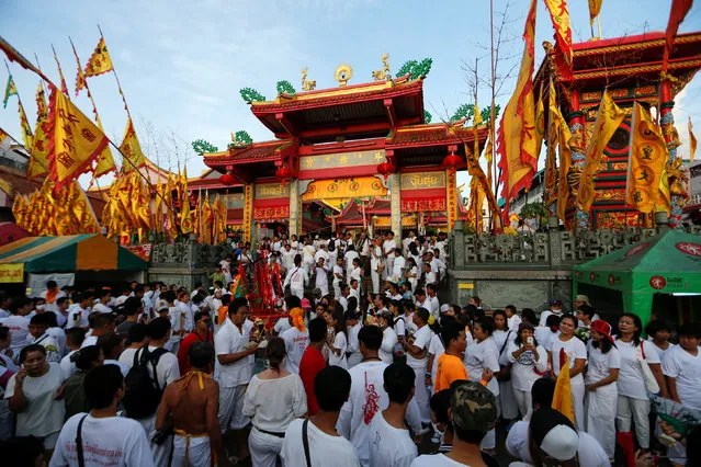 Devotees of the Chinese Jui Tui shrine take part in a procession celebrating the annual vegetarian festival in Phuket, Thailand, October 7, 2016. (Photo by Jorge Silva/Reuters)