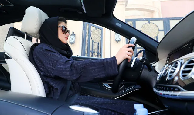 A Saudi woman practices driving in Riyadh, on April 29, 2018, ahead of the lifting of a ban on women driving in Saudi Arabia in the summer. In September 2017, a royal decree announced the end of a ban on women driving – the only one of its kind in the world – as of June 2018. (Photo by Yousef Doubisi/AFP Photo)