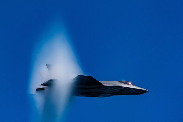 An F-35C fighter jet does a high speed pass as seen from the USS George H.W. Bush aircraft carrier in the Atlantic Ocean off the coast of Norfolk, Va., Saturday, October 4, 2025. (Photo by Alex Brandon/AP Photo)