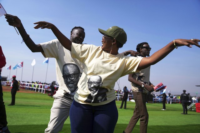 Supporters of Rwanda's President Paul Kagame dance during a campaign rally, in Kigali, Rwanda, July 12, 2024. (Photo by Brian Inganga/AP Photo)