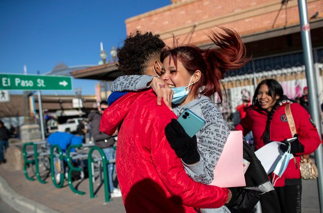 Venezuelan migrants Daniela Medina, right, and Oldris Rodriguez hug in celebration after entering the United States from Ciudad Juarez, Mexico through the Paso del Norte bridge, Monday, January 20, 2025 in El Paso, Texas. (Photo by Andres Leighton/AP Photo)