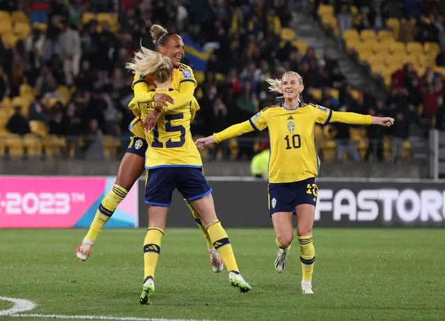 Rebecka Blomqvist of Sweden (L) celebrating her goal with her teammate Madelen Janogy of Sweden (C) during the FIFA Women's World Cup Australia & New Zealand 2023 Group G match between Sweden and Italy at Wellington Regional Stadium on July 29, 2023 in Wellington, New Zealand. (Photo by Amanda Perobelli/Reuters)
