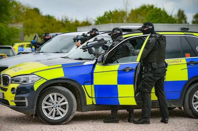 Members of Devon and Cornwall Police during training scenario where they are practicing an armed vehicle stop at the force headquarters in Exeter, as they prepare for the forthcoming G7 Summit in Cornwall on Tuesday, May 25, 2021. (Photo by Ben Birchall/PA Images via Getty Images)
