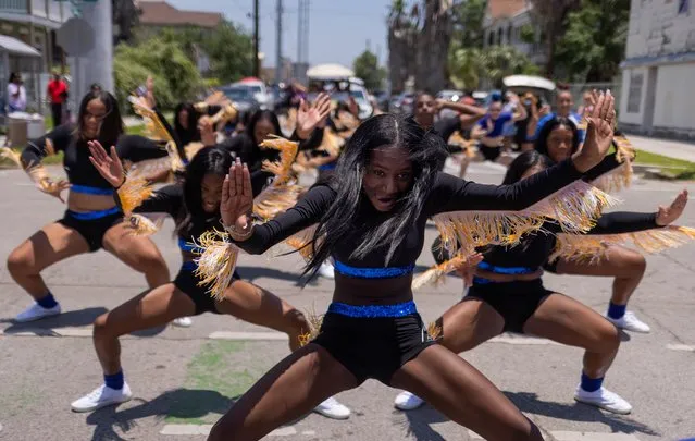 Members of the Texas Dancin' Divas take part in the Juneteenth Parade in Galveston, Texas, U.S., June 19, 2021. The United States marked Juneteenth for the first time as a federal holiday commemorating the end of the legal enslavement of Black Americans. (Photo by Adrees Latif/Reuters)