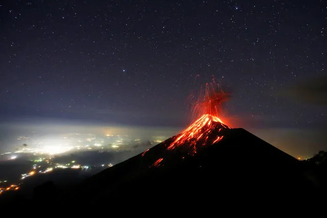 Fuego volcano spews lava during a nighttime eruption as seen from the Acatenango volcano in Guatemala, 28 November 2018. Fuego volcano averaged seven to ten explosive eruptions per hour on 28 November, according the Guatelama's National Coordinator for Disaster Reduction. (Photo by Esteban Biba/EPA/EFE)