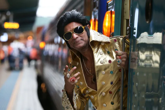 Elvis tribute artist Alfred Kaz, also known as “Bollywood Elvis” poses at Central Station ahead of boarding the “Elvis Express” on January 10, 2019 in Sydney, Australia. The Parkes Elvis Festival is held annually over five days, timed to coincide with Elvis Presley's birth date in January. (Photo by Lisa Maree Williams/Getty Images)