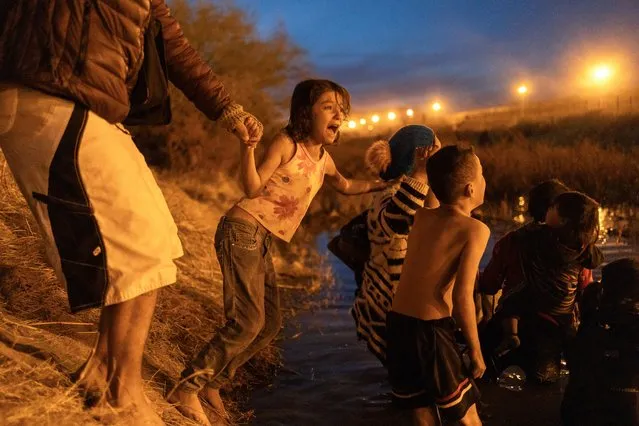 Hundreds of migrants attempt to cross the Rio Grande River to reach the United States to seek humanitarian asylum in Ciudad Juarez, Mexico on December 28, 2023. Approximately 1,500 people arrived at the border to seek asylum, but the Texas National Guard blocked their progress. (Photo by David Peinado/Anadolu via Getty Images)