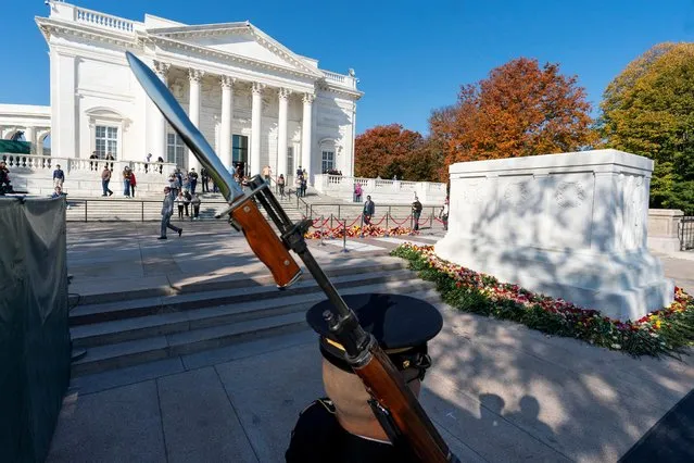 A tomb guard of the 3rd US Infantry Regiment, known as “The Old Guard”, stands during a centennial commemoration event at the Tomb of the Unknown Soldier, in Arlington National Cemetery on November 10, 2021, in Arlington, Virginia. (Photo by Alex Brandon/Pool via AFP Photo)