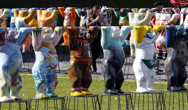 Buddy Bear sculptures are pictured at the Hesse state representation in Berlin, Germany, April 20, 2016. The colourful Buddy Bears designed by artists from different countries with unique features of his or her native country are on display in the garden. (Photo by Fabrizio Bensch/Reuters)