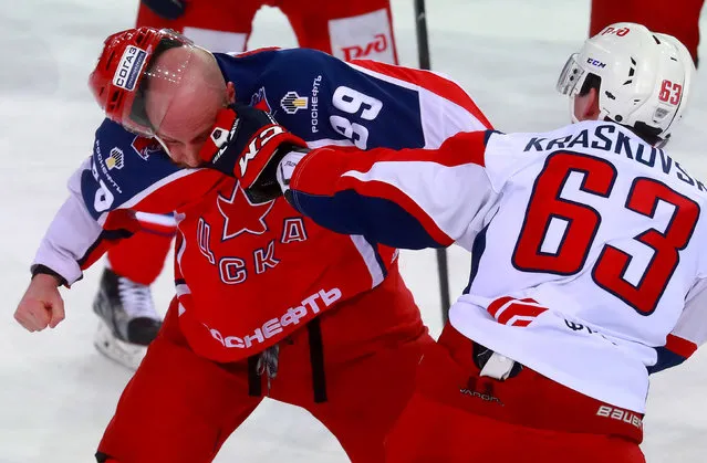 CSKA Moscow' s Jan Mursak (L) and Lokomotiv Moscow' s Pavel Kraskovsky fight in Leg 1 of their 2016/17 Season Kontinental Hockey League Western Conference semifinal playoff tie at CSKA Arena in Moscow, Russia on March 8, 2017. CSKA Moscow won the game 4-2. (Photo by Sergei Fadeichev/TASS)