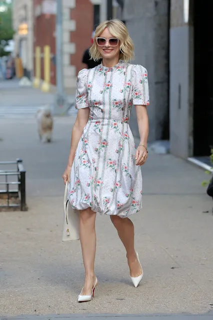 Actress Naomi Watts, wearing a floral summer dress and white handbag, leaves her apartment in New York City on July 24, 2019. (Photo by Christopher Peterson/Splash News and Pictures)