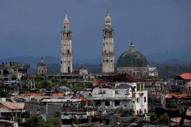 Dilapidated structures are seen at the most affected war-torn area of Marawi City, Lanao del Sur province, Philippines, May 11, 2019. The area remains abandoned two years since pro-Islamic State militants began their attacks on May 23, 2017. Marawi was once one of the most picturesque cities in the Philippines. About half of it is now charred concrete and skeletons of buildings, the effects of 154 days of air strikes and artillery by the military, and booby traps the rebels laid everywhere to keep them at bay. (Photo by Eloisa Lopez/Reuters)