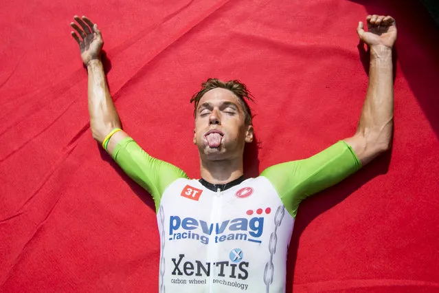 Thomas Steger reacts after winning the IRONMAN 70.3 Zell am See on September 01, 2019 in Salzburg, Austria. (Photo by Jan Hetfleisch/Getty Images for IRONMAN)
