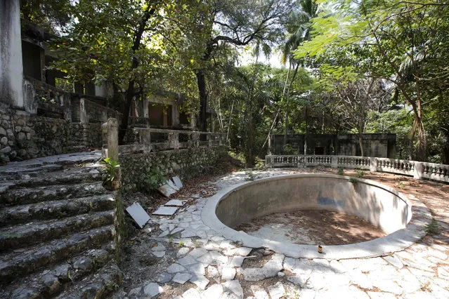 This Thursday, February 16, 2017 photo shows the remains of Habitation Leclerc in Port-au-Prince, Haiti. In the ruins, a group of abandoned children found shelter but were barely surviving. Exploiting that desperation, U.N. peacekeepers lured them into a child s*x ring. In August 2007, the U.N. received complaints of “suspicious interactions” between Sri Lankan soldiers and Haitian children, launching an investigation. (Photo by Dieu Nalio Chery/AP Photo)