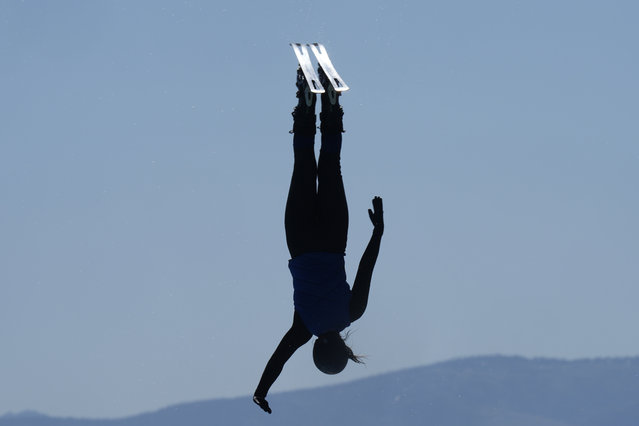 An aerials skiing athlete jumps at the Eccles Olympic Freestyle Pool, Thursday, June 13, 2024, in Park City, Utah. US Ski and Snowboard athletes train during the summer offseason to prepare for winter competition. (Photo by Rick Bowmer/AP Photo)