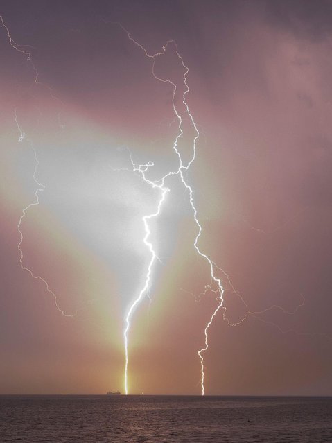 Lightning seen from Minster on Sea, Kent, UK during a thunderstorm on May 2, 2024. (Photo by James Bell/Alamy Live News)