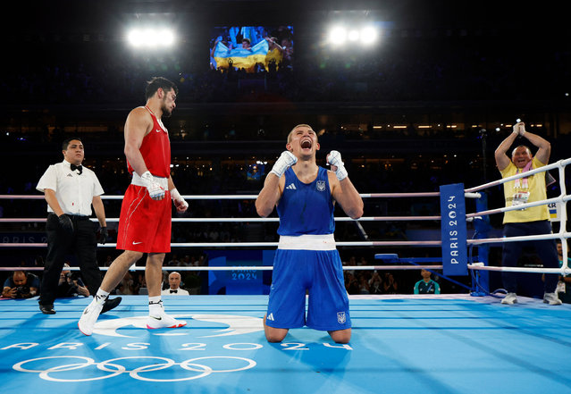 Oleksandr Khyzhniak, of Ukraine, celebrates after winning gold against Nurbek Oralbay of Kazakhstan in the men’s 80kg boxing at Roland-Garros Stadium in Paris, France on August 07, 2024. (Photo by Peter Cziborra/Reuters)