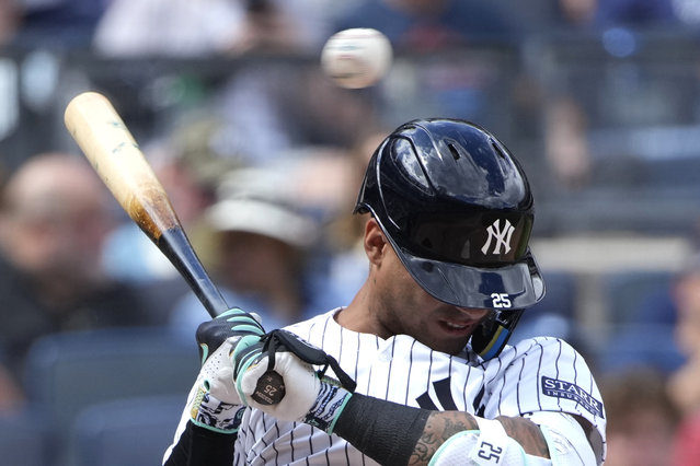 New York Yankees' Gleyber Torres ducks to avoid a pitch thrown by Cleveland Guardians pitcher Gavin Williams during the fifth inning of a baseball game, Thursday, August 22, 2024, in New York. (Photo by Pamela Smith/AP Photo)