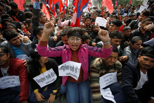 Nepalese students protest against the new map of India near the Indian Embassy in Kathmandu Nepal on November 8, 2019. (Photo by Navesh Chitrakar/Reuters)