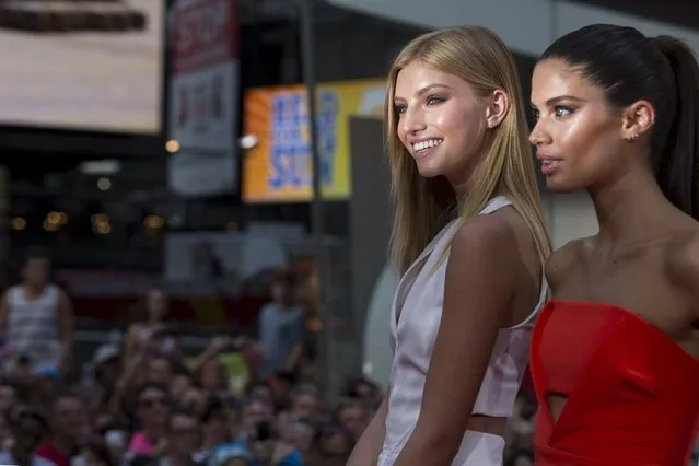 Models Niamh Adkins (L) and Sara Sampaio pose on the red carpet for a screening of the film “Mission Impossible: Rogue Nation” in New York July 27, 2015. (Photo by Brendan McDermid/Reuters)