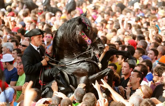 Spectacular Fiesta of San Joan in Menorca. (Photo by Enrique Calvo/Reuters)