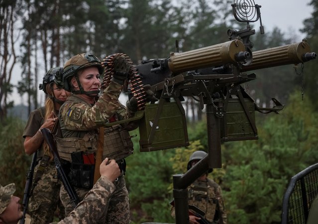 Members of the female anti-drone mobile air defence unit “Bucha Witches” from the military Volunteer formation of Bucha territorial community, attend exercises near the town of Bucha in Kyiv region, Ukraine on August 3, 2024. (Photo by Gleb Garanich/Reuters)