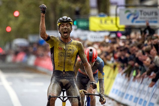 French rider of team Visma Lease A Bike Christophe Laporte reacts as he crosses the finish line ahead of Czeck rider of team Lidl-Treck Mathias Vacek (R) to win the 118th edition of the 213,9 km Paris-Tours one day cycling race, in Tours, central France on October 6, 2024. (Photo by Guillaume Souvant/AFP Photo)