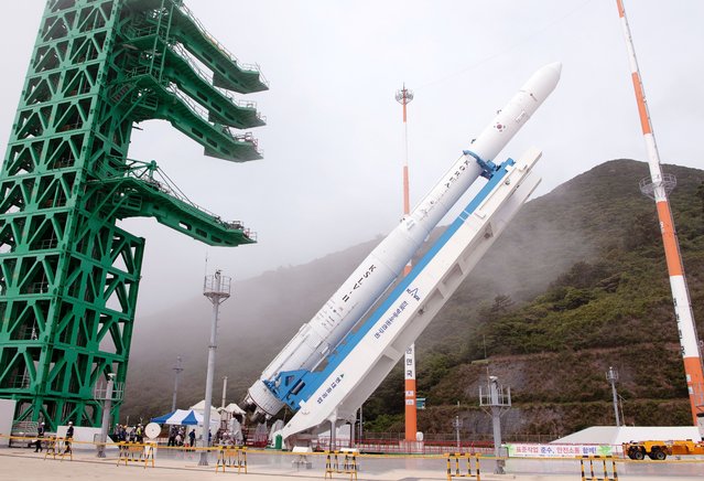 A handout photo made available by the Korea Aerospace Research Institute (KARI) shows South Korea's second homegrown space rocket, called Nuri, raised up to launch in the Naro Space Center in Goheung, South Jeolla Province, some 473km south of Seoul, South Korea, 20 June 2022, South Korea will launch that Nuri on 21 June 2022. The launch was rescheduled to Tuesday 21 June after aerospace engineers replaced the malfunctioning part. (Photo by Korea Aerospace Research Institute/EPA/EFE)