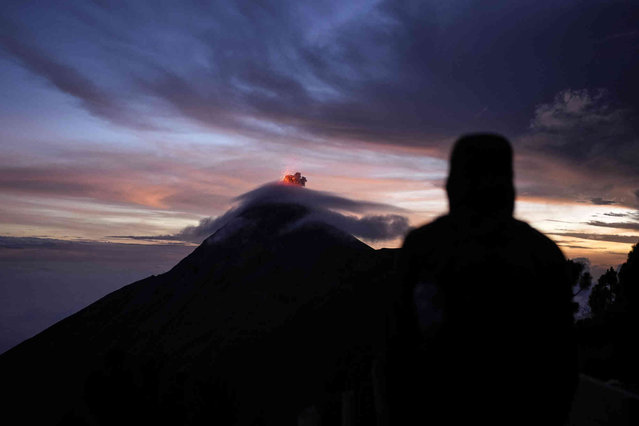 Volcan de Fuego, or Volcano of Fire, spews hot molten lava from its crater, near Antigua, Guatemala, Wednesday, October 30, 2024. (Photo by Matias Delacroix/AP Photo)