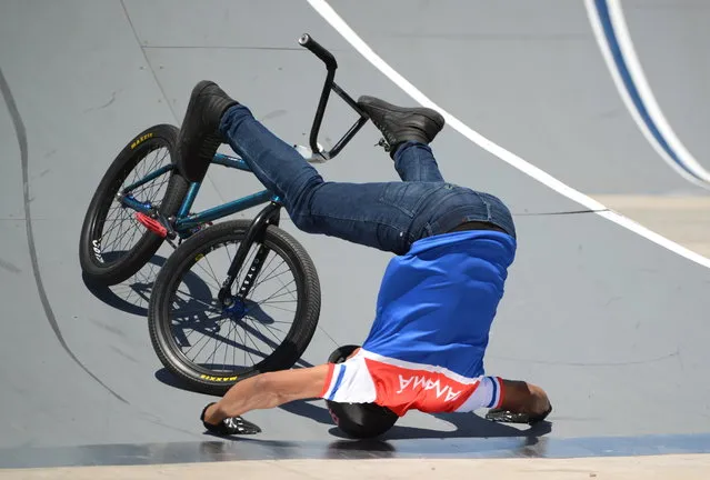Anthony de Leon of Panama falls while competing in men's BMX freestyle during the XII South American Games in Asuncion, Paraguay, 08 October 2022. (Photo by Martin Crespo/EPA/EFE)